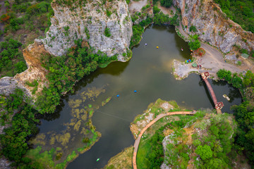 aerial over view khao ngoo mountain rock or snake mountain rock are high cliff and landmark ratchaburi province thailand