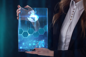 The concept of business, technology, the Internet and the network. A young entrepreneur working on...