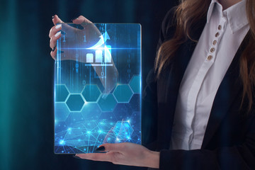 The concept of business, technology, the Internet and the network. A young entrepreneur working on...