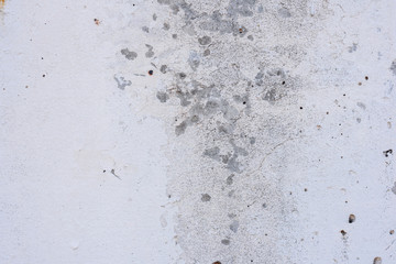Texture, wall, concrete, it can be used as a background. Wall fragment with scratches and cracks
