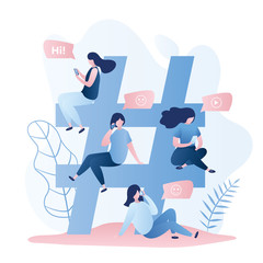 Big hashtag sign and group of cute girls with smartphones,social network and mobile communication