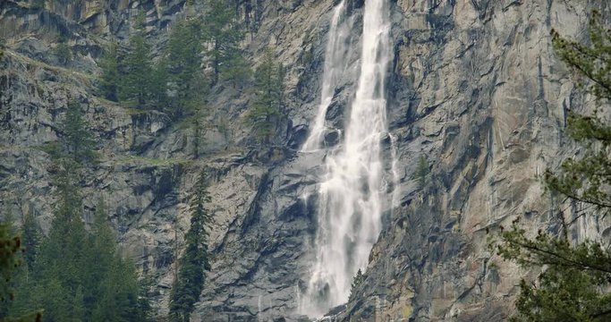 Pan Down Massive Waterfall Drury Falls Roadside View by Leavenworth Washington