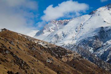 snow on the mountain and clouds 