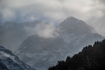 snow on the mountain and clouds 