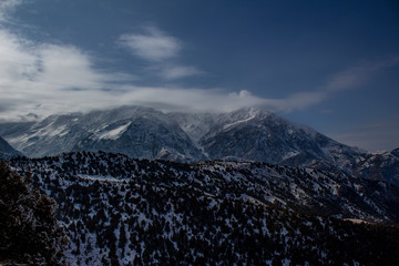 snow on the mountain and clouds 