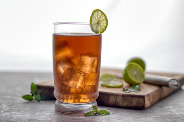Delicious freshly made home cold ice tea, over a white background
