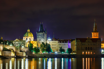 .Night view of the Vltava River and Charles Bridge in the city of Prague. Czech Republic.