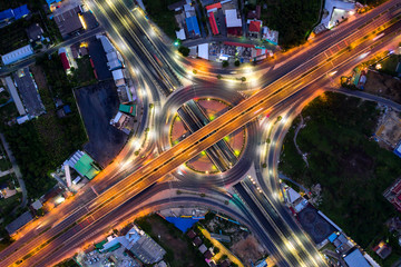 Fototapeta na wymiar Aerial view of highway junctions Top view of Urban city, Bangkok at night, Thailand.