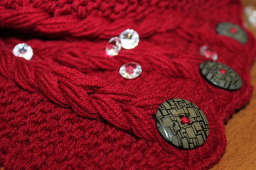  close-up red wool scarf knit with buttons