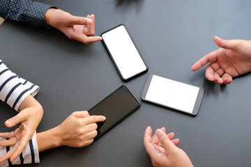 business people discussing using smart mobile phone