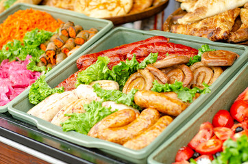 Street food, different fried sausages.