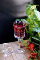 alcohol cherry cocktail in a glass