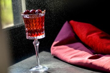 alcohol cherry cocktail in a glass