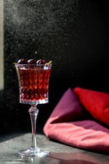 alcohol cherry cocktail in a glass