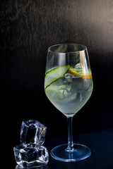 cocktail with kiwi and non-alcoholic cucumber in a glass