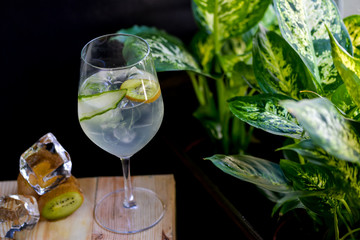 cocktail with kiwi and non-alcoholic cucumber in a glass