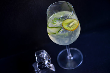 cocktail with kiwi and non-alcoholic cucumber in a glass