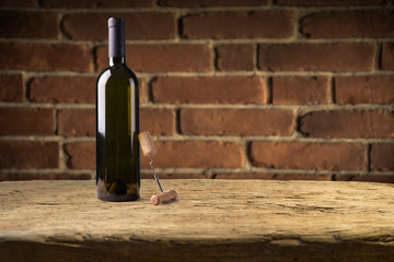 Red and white wine in bottles in wine shop