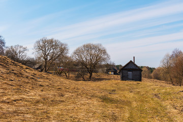 small house in the village in early spring