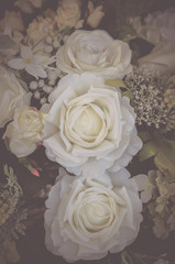 Flowers in the design of natural dark tones.