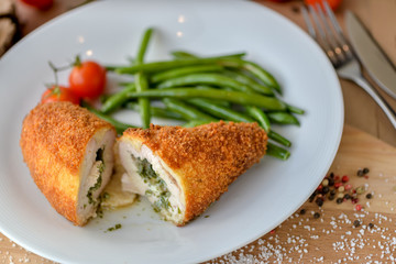 grilled salmon steak with vegetables and sauce