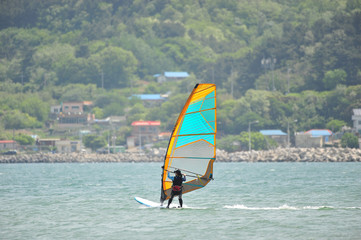 Wind surfing at the sea