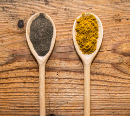 Fresh and dried spices-seasoning on wooden rustic table