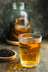 Kombucha tea on rustic background