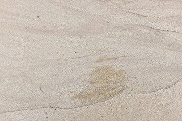 Fototapeta na wymiar Sea sand water wave patterns