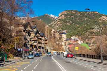 Village of La Massana in Andorra on sunny winterday in december. Andorra is a sovereign landlocked microstate on the Iberian Peninsula, in the eastern Pyrenees, bordering France and Spain - obrazy, fototapety, plakaty