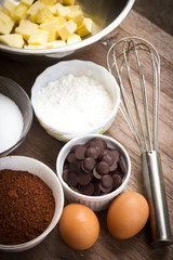 Variety ingredient of Brownie. On wooden table. Top view. Favorite dessert for chocolate lover. With dark vignette.