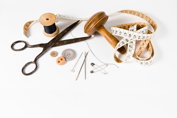 Tailor still life set on white background, vintage tools.