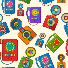 Vintage cameras and phones hand drawn pop art style seamless pattern.