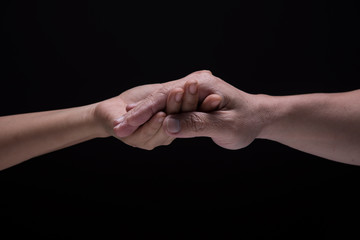 Hand hold together mean be in take care, agreement,power and friendship.