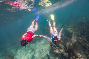 Women snorkeling, Turneffe Atoll, Belize Barrier Reef, Belize