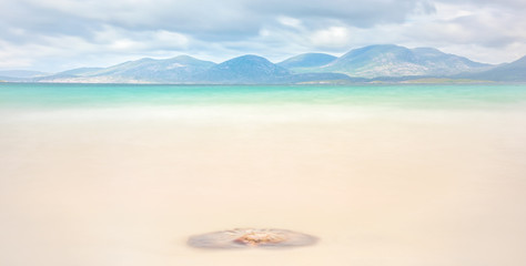 Isle of Harris landscape - beautiful endless sandy beach and turquoise ocean