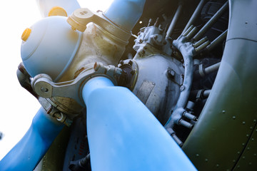 Old military airplane propeller closeup, military aircraft detail aviation photography.