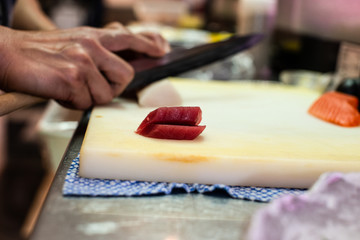 preparing and cooking sushi satshimi for japanese food