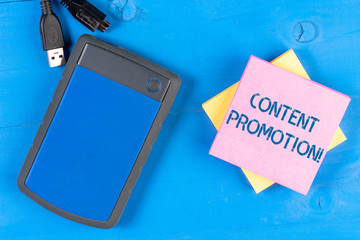 Writing note showing Content Promotion. Business concept for about getting content in front of the...