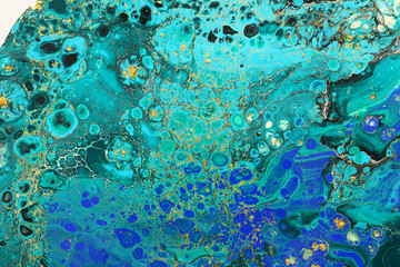 Fototapeta na wymiar Abstract marbleized effect background. Blue creative colors. Beautiful paint with the addition of gold