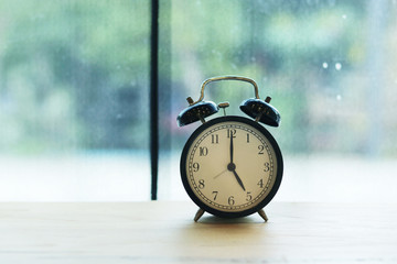 old alarm clock on the table