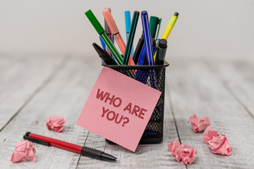 Conceptual hand writing showing Who Are You Question. Concept meaning asking about someone identity...