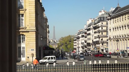 City life in Paris, France with a view of the Eiffel Tower