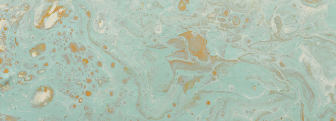 Abstract marbleized effect background. Blue creative colors. Beautiful paint with the addition of gold. banner