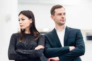 Portrait of unhappy couple not speaking after having dispute. Concept of unhappiness family