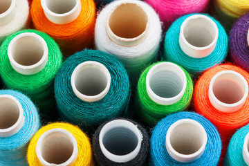 Colorful spools of sewing thread. Colored thread for sewing