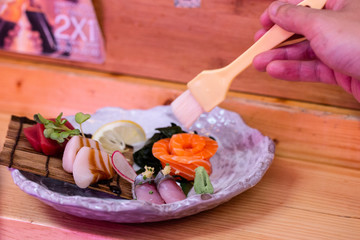 preparing delicious japanese food with fish