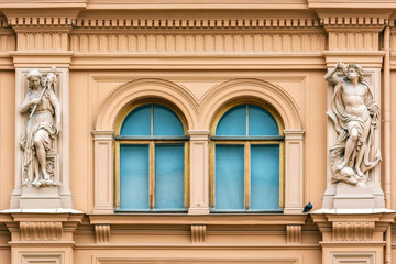 Windows with stucco figures.