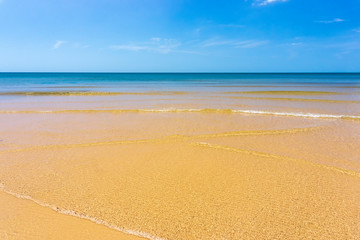 Tropical sea beach sand with blue sky in sunny day