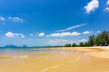 Tropical sea beach sand with blue sky in sunny day